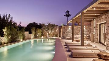 Seasonal outdoor pool, pool umbrellas, pool loungers