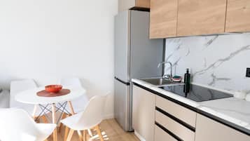 Fridge, stovetop, cookware/dishes/utensils