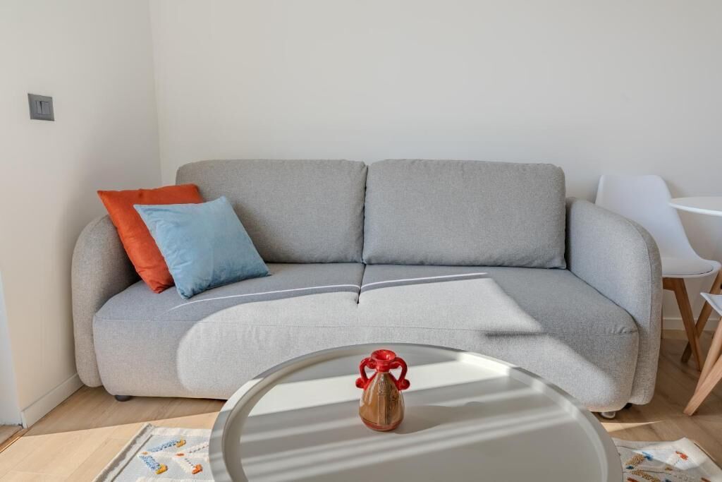 Comfort-Apartment, Balkon, Stadtblick | Wohnbereich