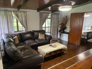 Chalet, Patio, Garden View | Living area - Little Creek Cabins (Port Edward)
