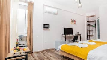 In-room safe, desk, laptop workspace, iron/ironing board