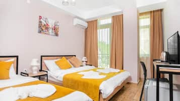 Chambre Triple Classique, vue jardin
