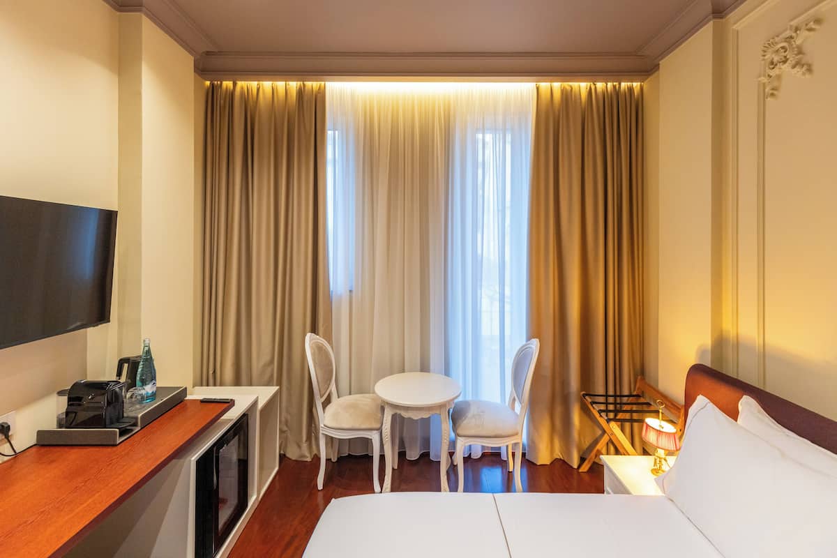 Room 105 | Frette Italian sheets, premium bedding, memory foam beds