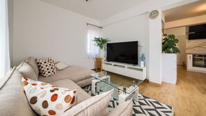 Casa (2) | Área de sala de estar | Televisión de pantalla plana 