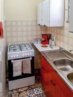 Apartamento, patio | Cocina privada