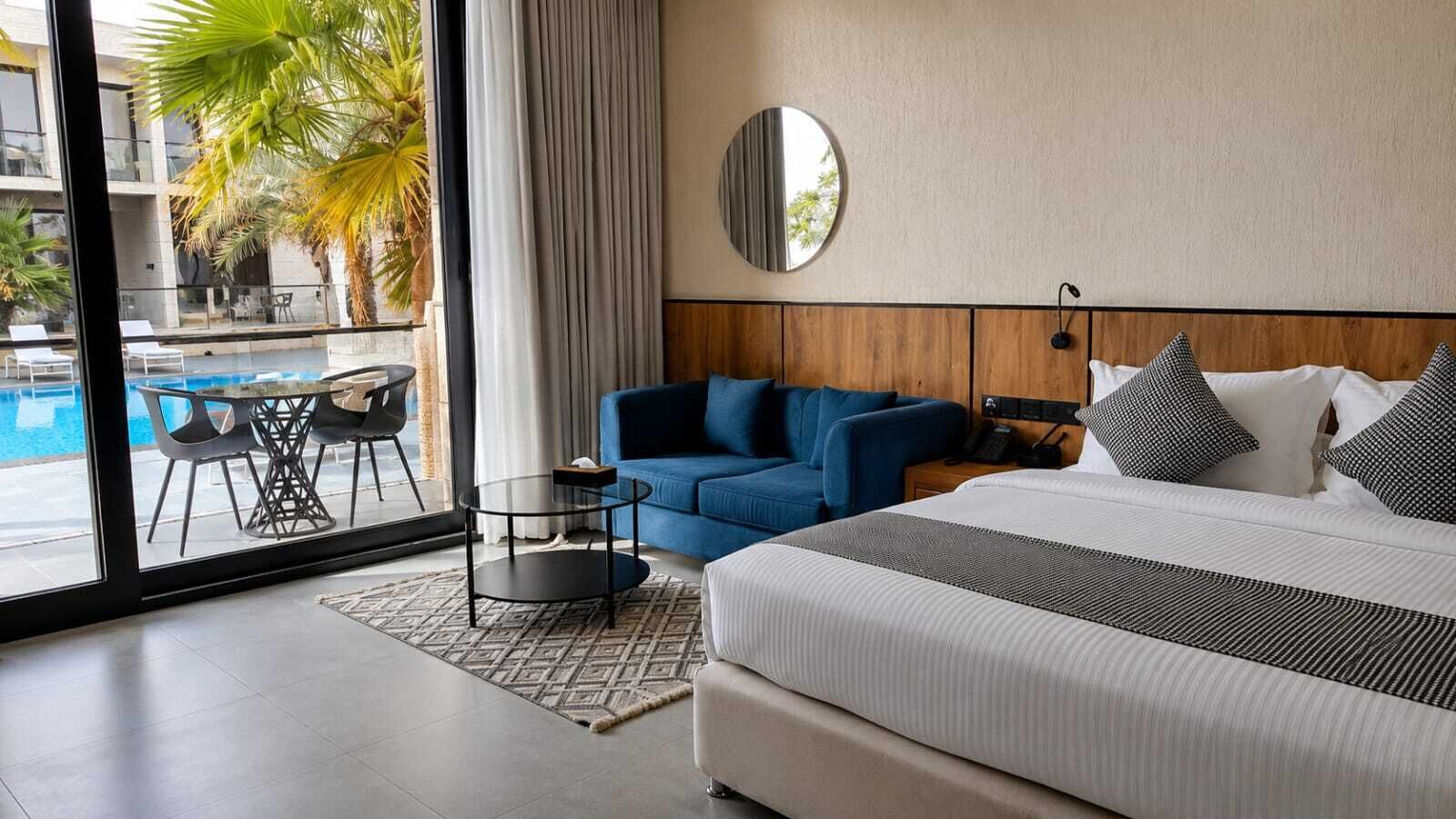 Room, Balcony, Pool View | In-room safe, blackout curtains, soundproofing, iron/ironing board