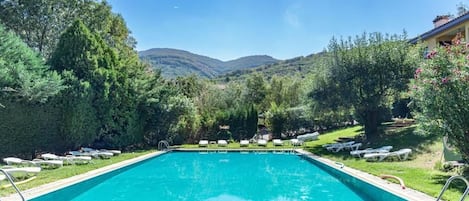 Seasonal outdoor pool, pool umbrellas, sun loungers