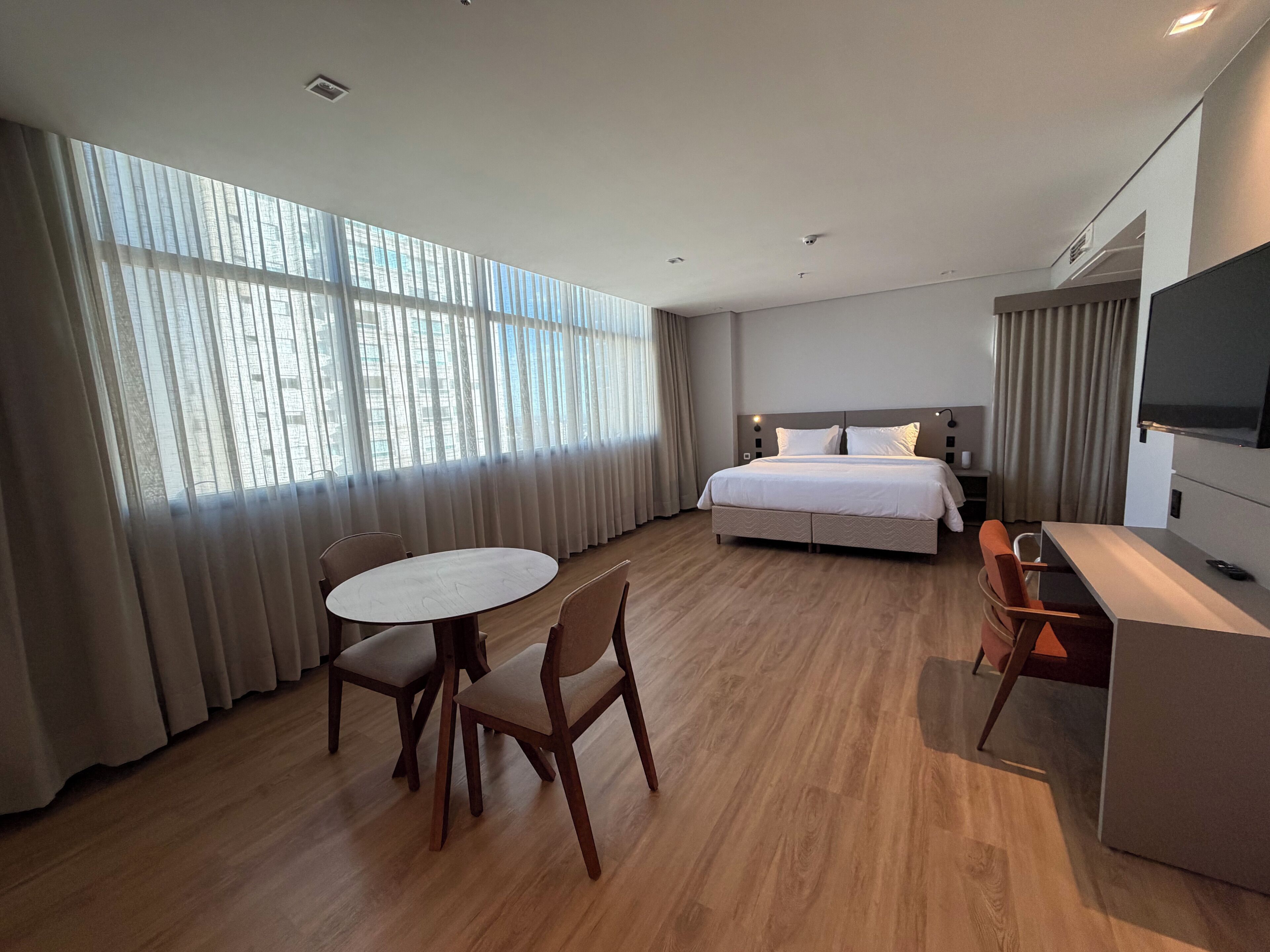 Junior Suite | Minibar, in-room safe, laptop workspace, iron/ironing board