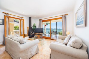 TV - 'Voramar 85' Apartment with Sea Views, Wi-Fi, and Air Conditioning (Port de Pollença)