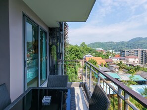 Outdoor dining - ET309 Mountain view apartment - quiet area, pool (Patong Beach)
