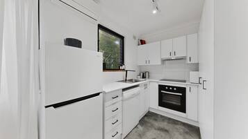 Apartment | Private kitchen | Fridge, cookware/dishes/utensils
