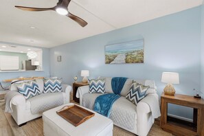 Smart TV, books - 🌊🏖️ Sea Coast Condominium 517 | Top Floor | Renovated | No-Drive Beach (New Smyrna Beach)