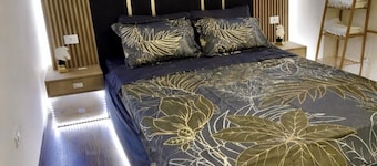 Ultra-Central Apartment with Private Courtyard + Private Parking