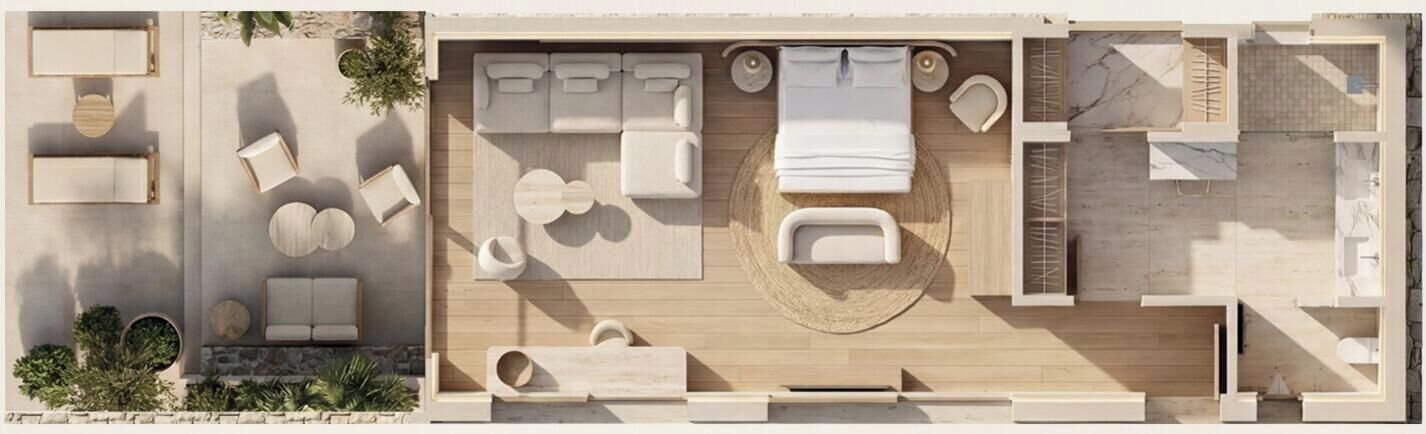 A modern hotel room with a wooden floor, a bed, a sitting area with a sofa and chairs, a small table, and a window.