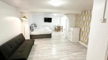 Studio, Patio | Living area