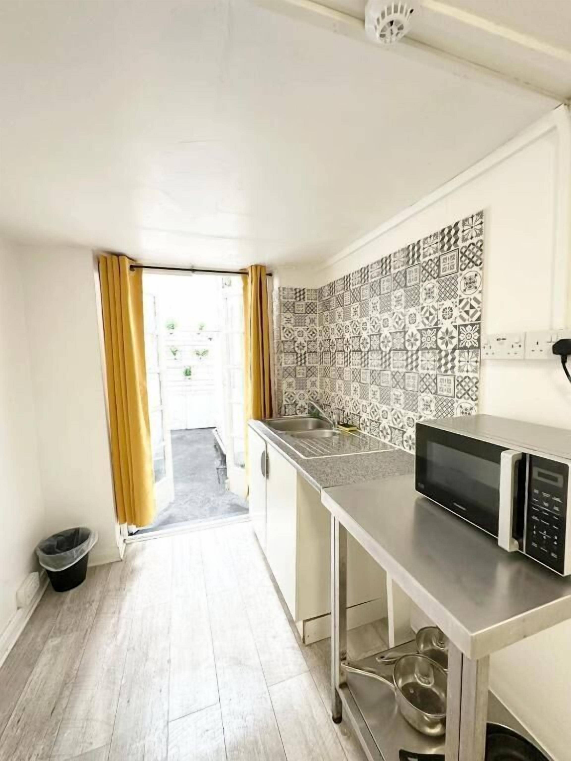 Studio, patio | Cuisine privée