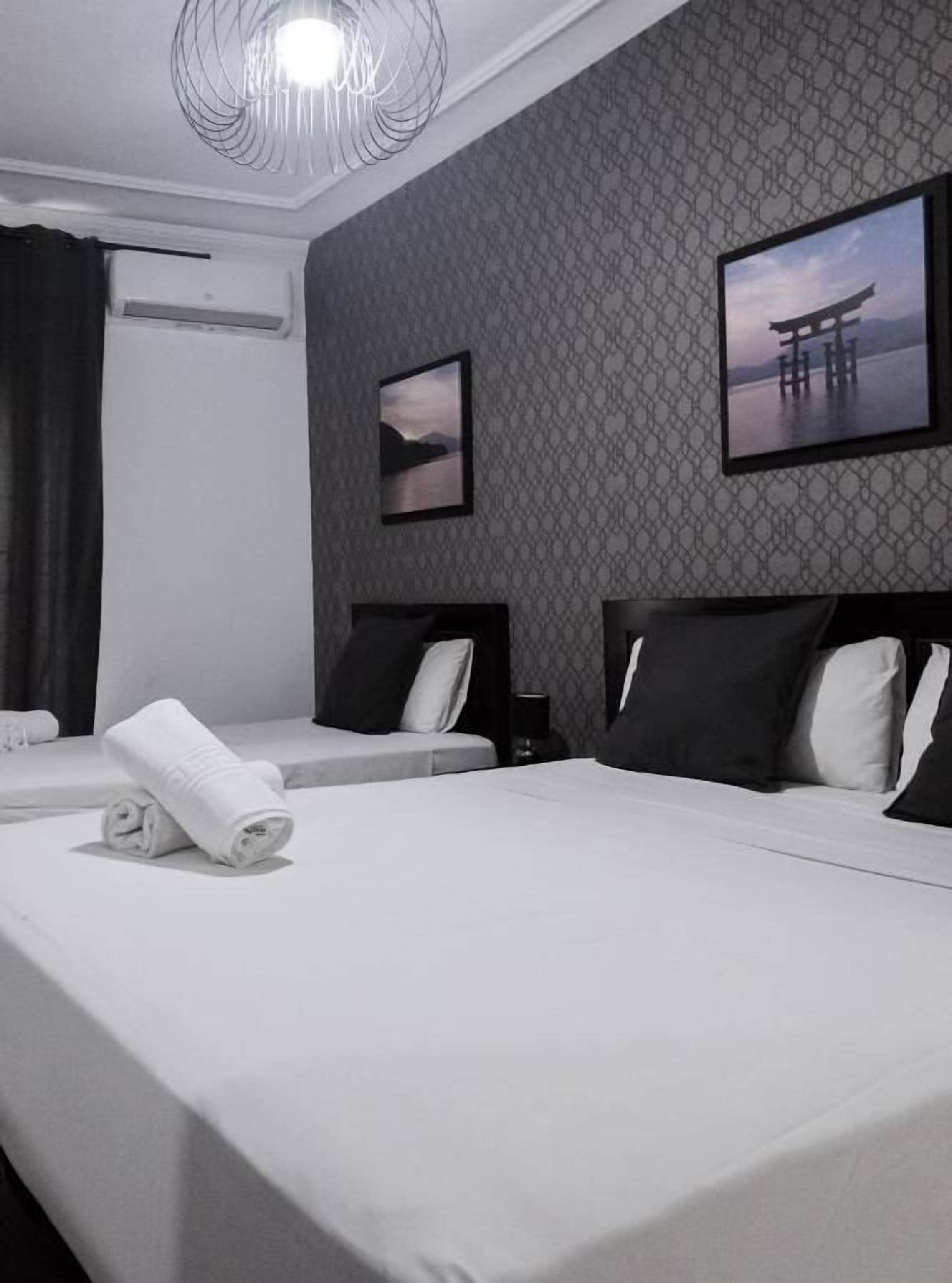 Habitación triple Deluxe, balcón, vista a la ciudad | Wifi gratis 