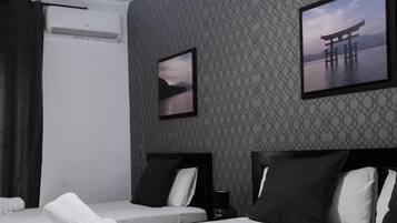 Habitación triple Deluxe, balcón, vista a la ciudad | Wifi gratis
