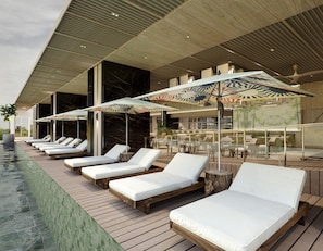 Outdoor pool, pool umbrellas, sun loungers