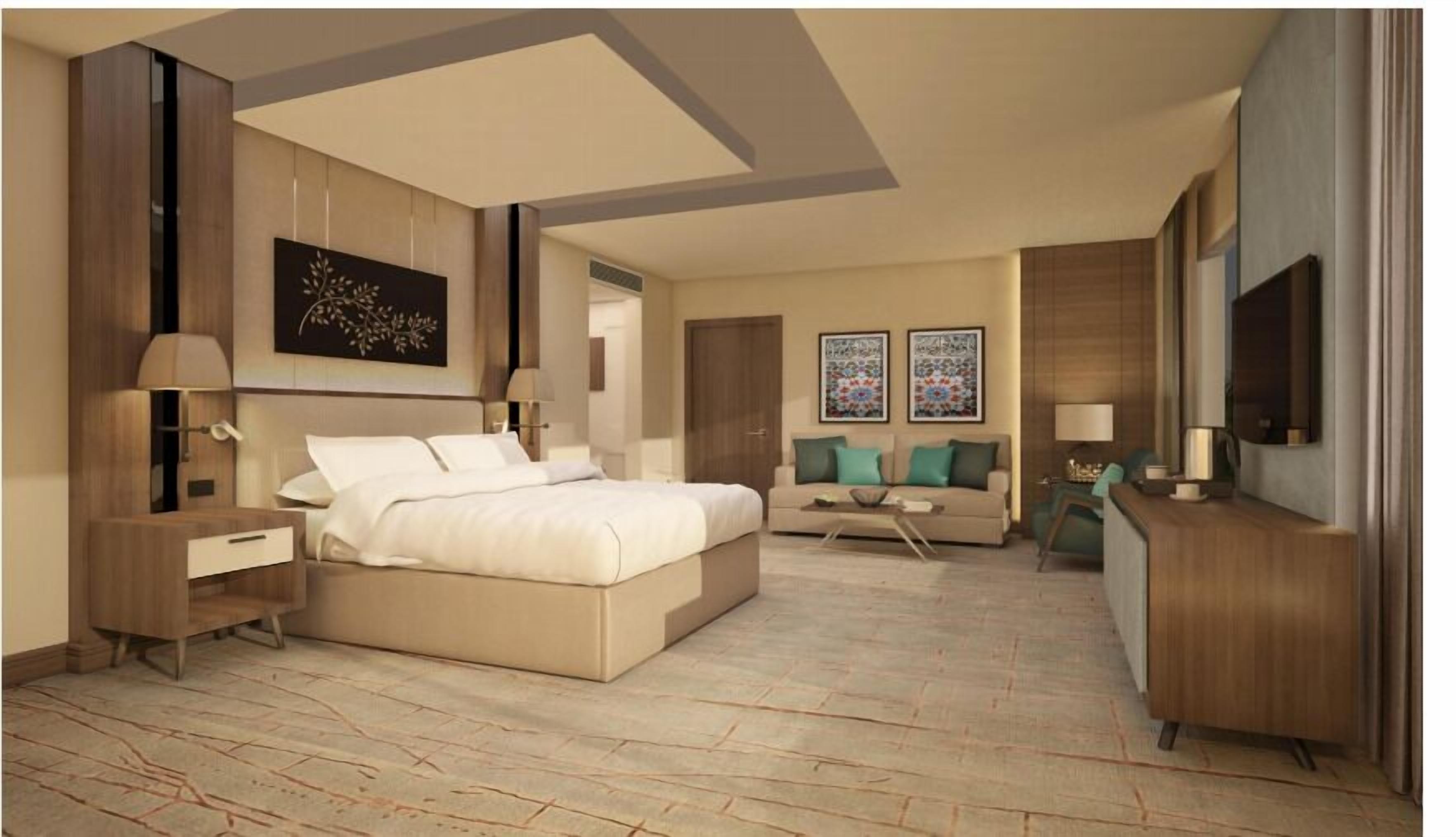 Junior Suite, 1 King Bed, Sea View | Minibar, in-room safe, desk, laptop workspace