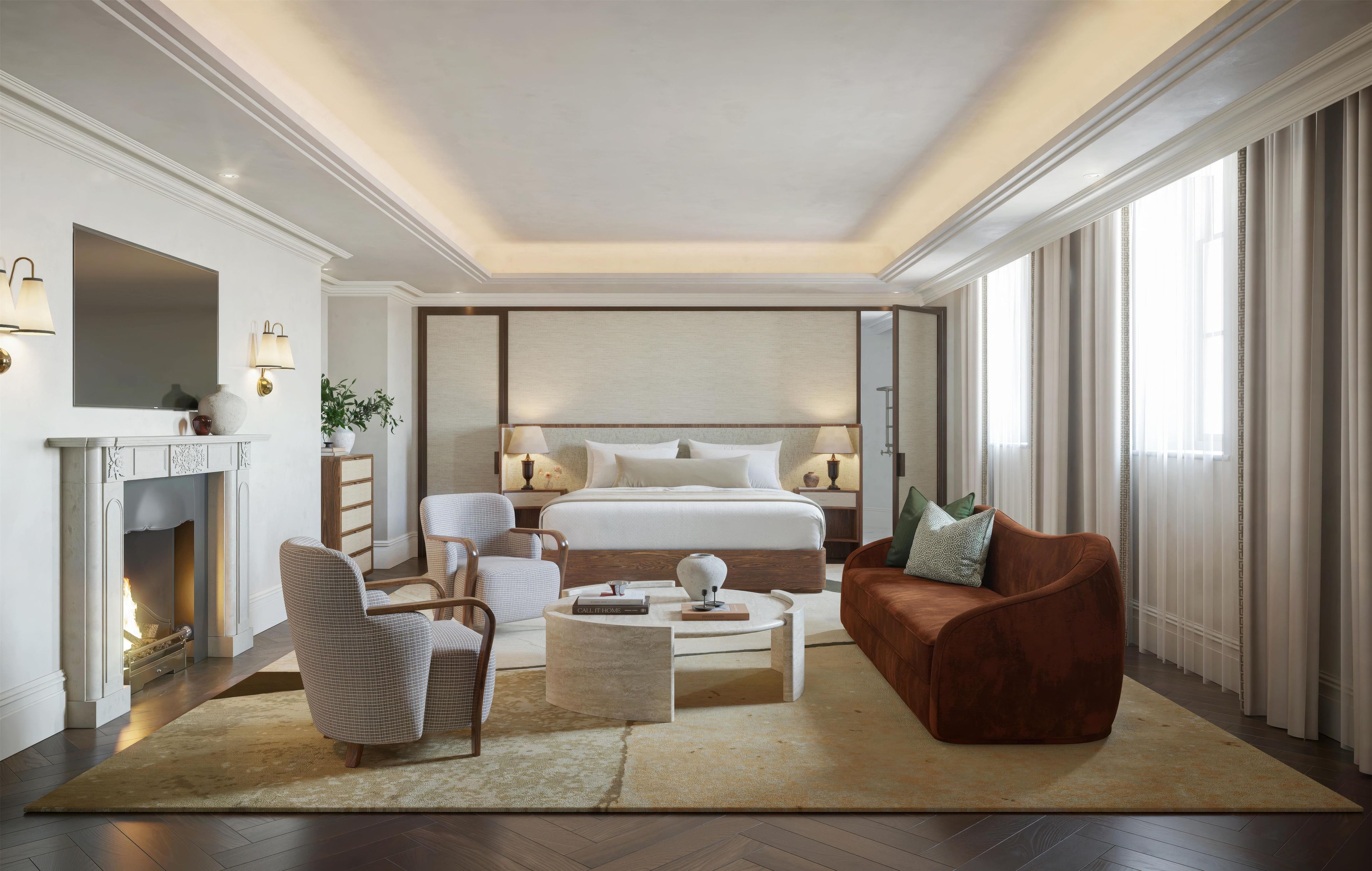 Une chambre à coucher moderne avec un grand lit, des lampes de chevet, une cheminée et une vue sur l’extérieur.