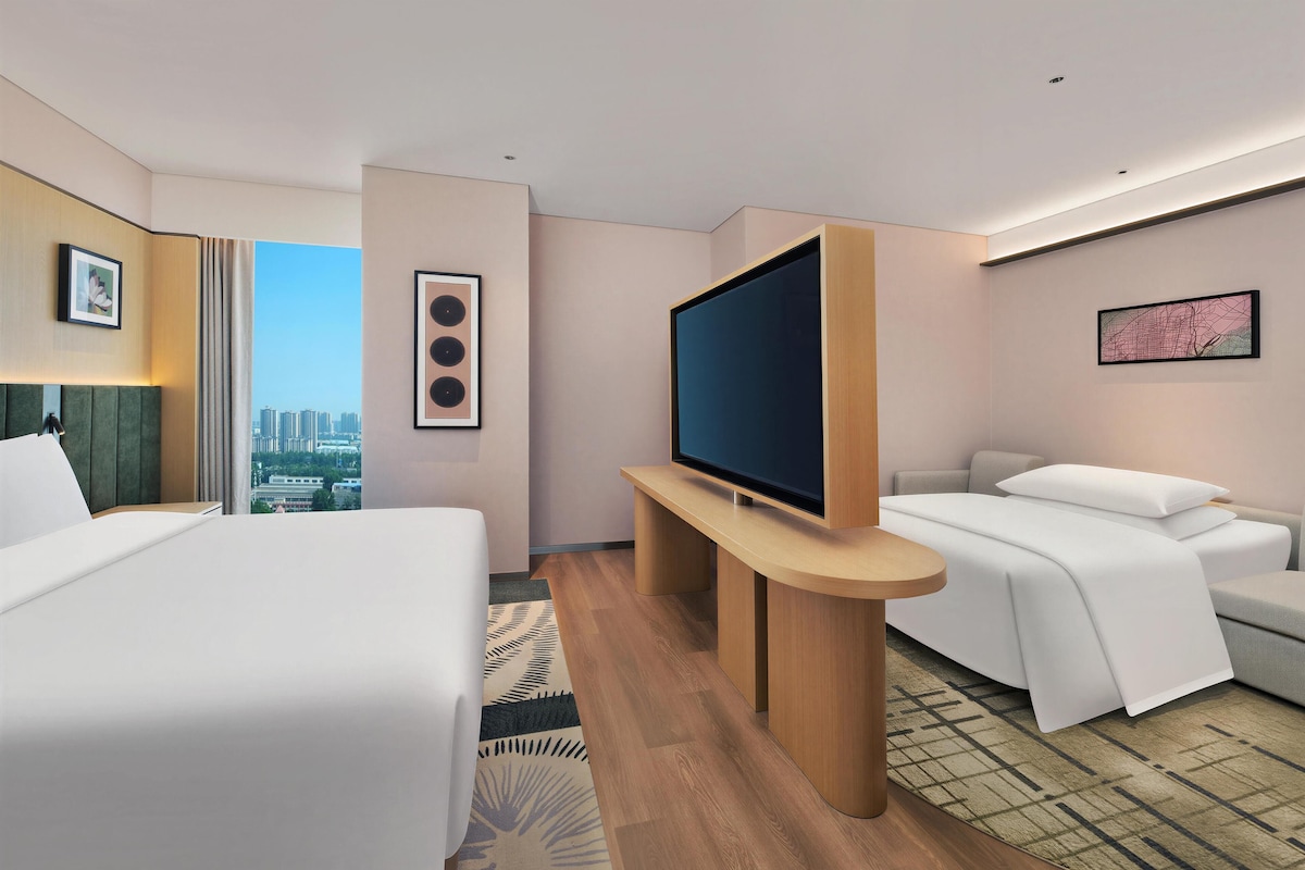 Chambre Deluxe, 1 très grand lit et 1 canapé-lit