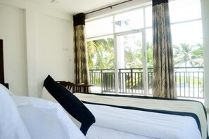 Kamar Double Deluks, balkon, pemandangan samudra | Ruang kerja ramah laptop