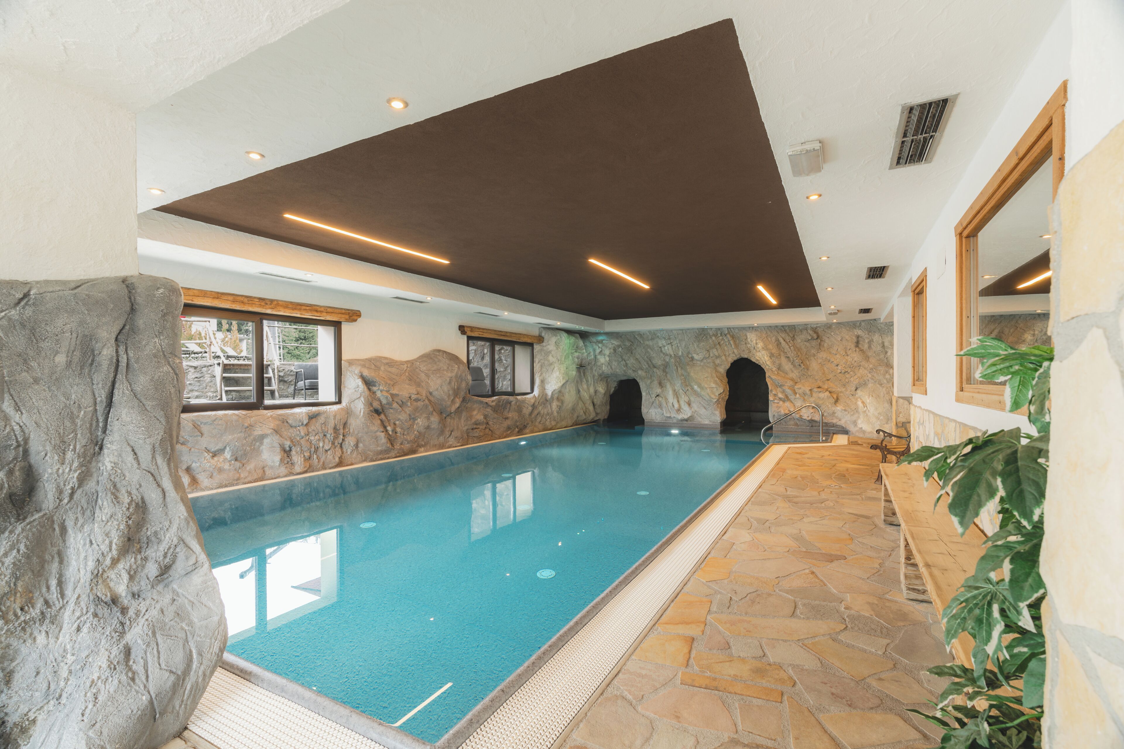 Indoor pool, open 10:00 AM to 7:30 PM, pool loungers