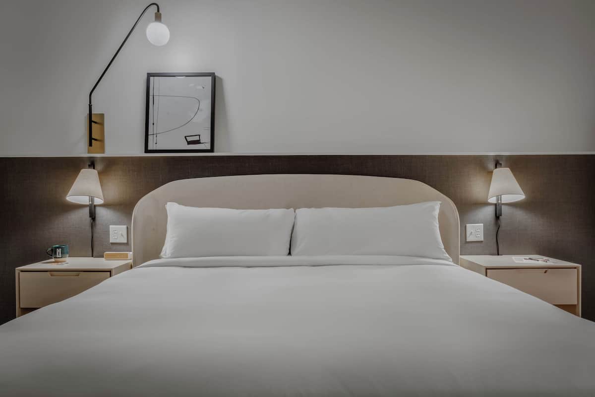 Premium bedding, down duvets, desk, laptop workspace