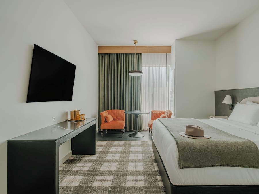 Premium bedding, down comforters, desk, laptop workspace