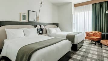 Premium bedding, down comforters, desk, laptop workspace