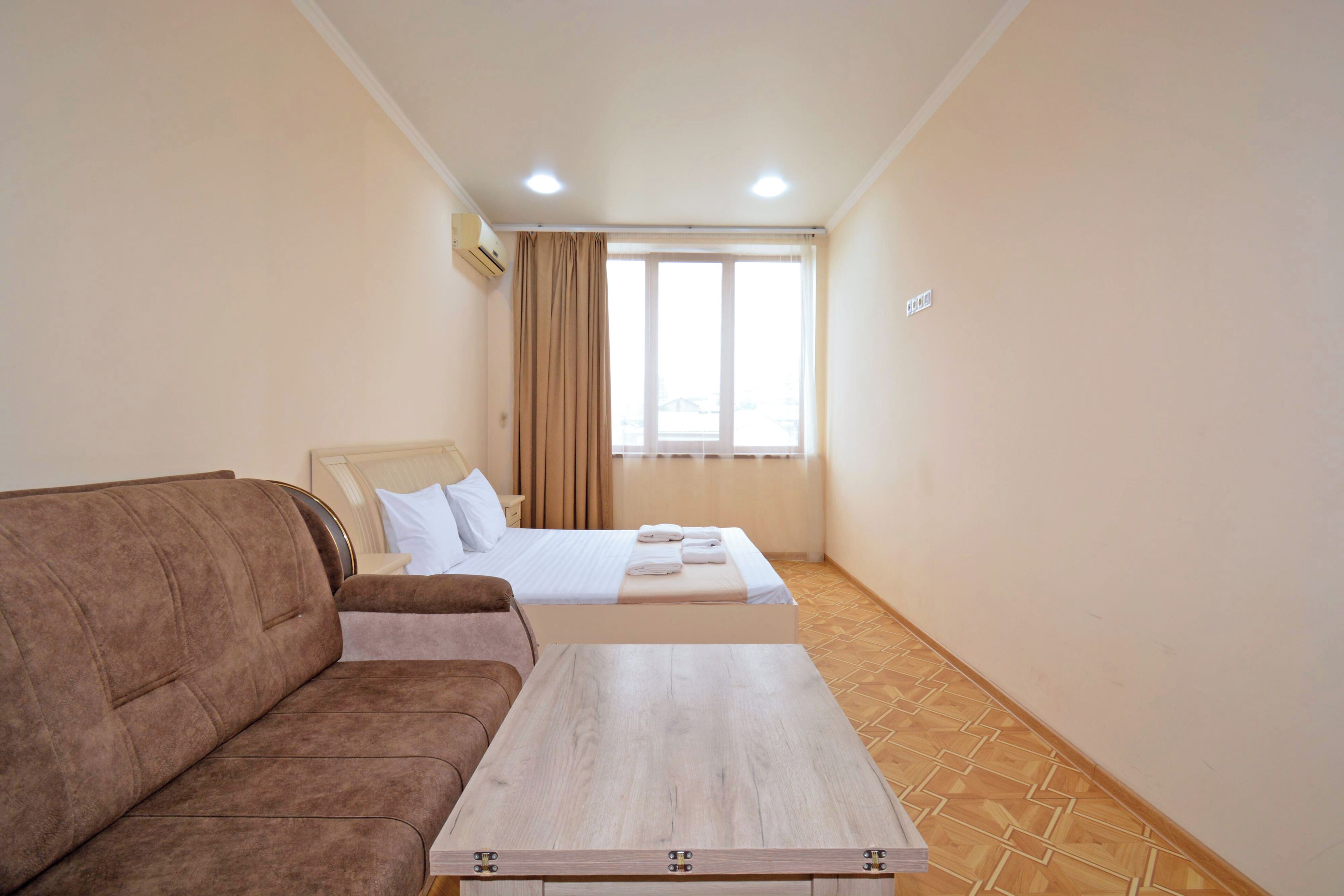 Standard Apartment, City View | Desk, laptop workspace, free WiFi, bed sheets