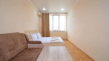 Standard Apartment, City View | Desk, laptop workspace, free WiFi, bed sheets
