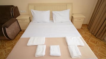 Standard Apartment, City View | Desk, laptop workspace, free WiFi, bed sheets