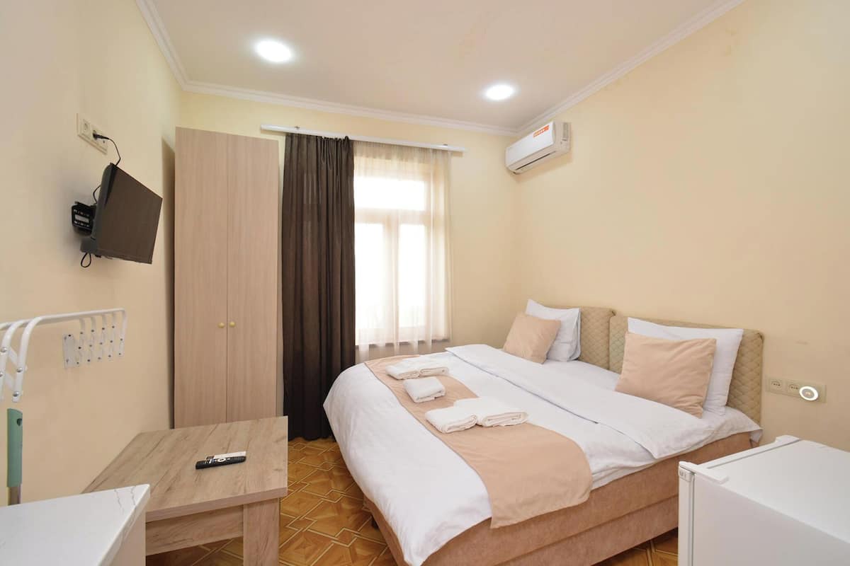 Standard Apartment, City View | Desk, laptop workspace, iron/ironing board, WiFi (free)