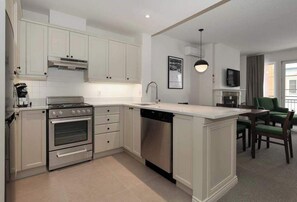 Fridge, microwave, oven, stovetop - Village Condo with Balcony & Views - Walk Everywhere (Mont-Tremblant)
