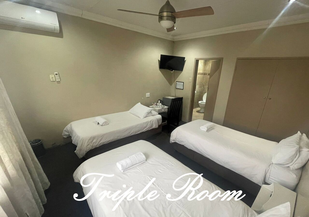Chambre Triple | Fer et planche à repasser, Wi-Fi gratuit, draps fournis
