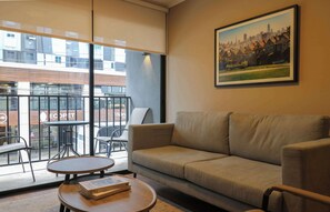 TV, offices - w* | Design-Forward 2BR w/ Balcony in Miraflores (Miraflores)