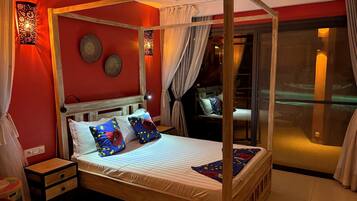 Deluxe Suite, Ocean View | Premium bedding, down comforters, in-room safe, individually decorated