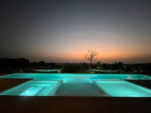 Outdoor pool, open 8:00 AM to 10:00 PM, pool umbrellas, pool loungers