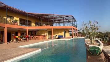 Outdoor pool, open 8:00 AM to 10:00 PM, pool umbrellas, sun loungers