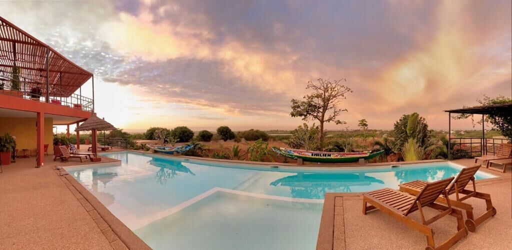 Outdoor pool, open 8:00 AM to 10:00 PM, pool umbrellas, pool loungers