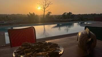 Outdoor pool, open 8:00 AM to 10:00 PM, pool umbrellas, pool loungers