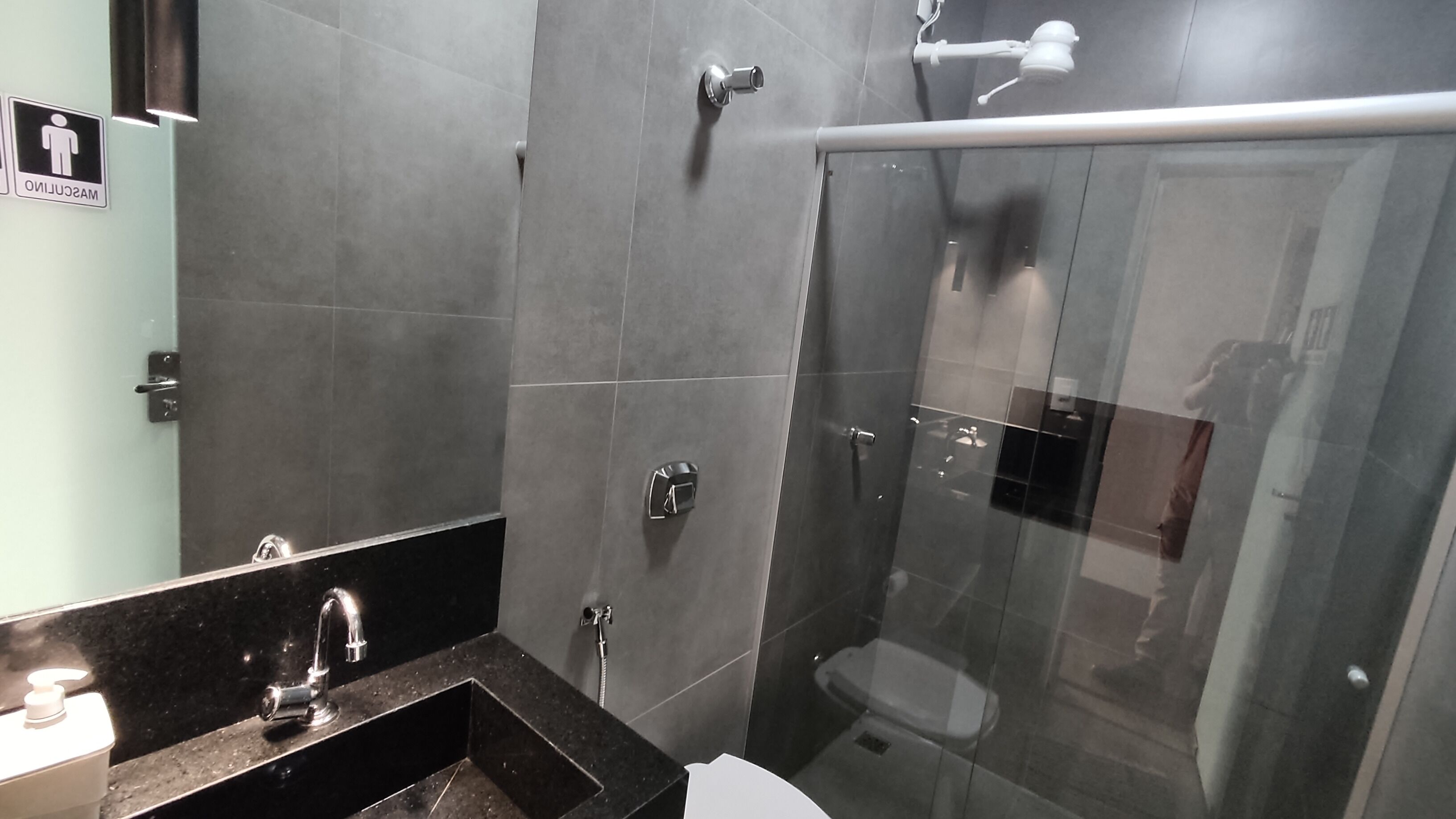 Shower, towels, soap, toilet paper