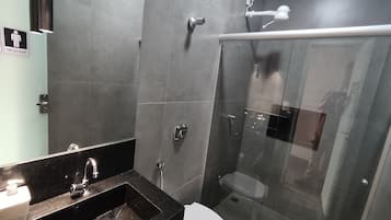 Shower, towels, soap, toilet paper