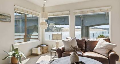 Incredible Riverfront Oasis with Wraparound Deck & Cozy Interior!