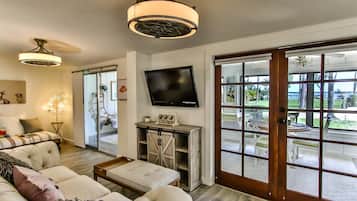 Suite Life , Pet Friendly | Living area | TV, printers