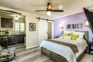 Deluxe Suite, Courtyard View | Blackout drapes, iron/ironing board, free WiFi