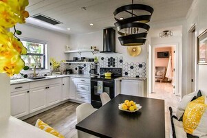 Suite Life , Pet Friendly | Private kitchen | Microwave, stovetop, cookware/dishes/utensils