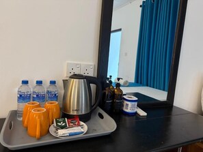 Habitación doble Deluxe, balcón, vista al océano | Alimentos y bebidas